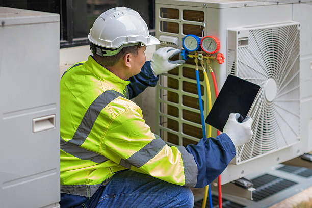 Professional Air Duct Cleaning technician working in Bingen, WA
